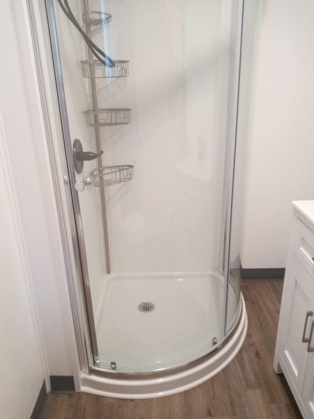 Master bath remodel with subway tile shower and patterned floor
